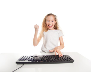 Child looking at a computer