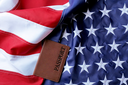Passport lying on American Flag background