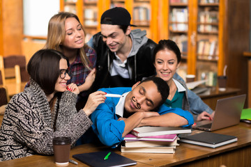 Students joking at groupmate