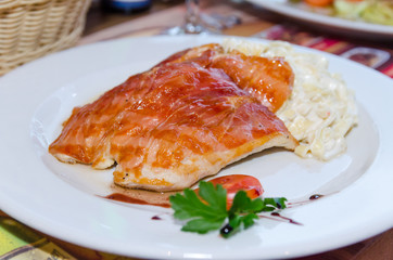 Chicken slices with ham and pasta