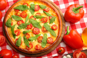 Pizza Margherita with arugula and vegetables, close-up