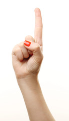 Woman hand making sign isolated on white background