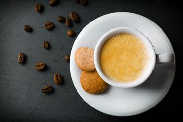Cup of coffee on gray background