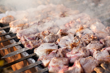 beef and pork steak bbq on the grill