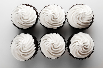 Tasty cupcakes isolated on white background