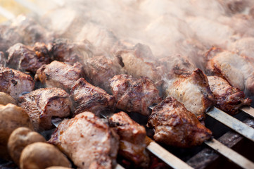 beef and pork steak bbq on the grill
