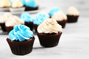 Cupcakes on wooden background