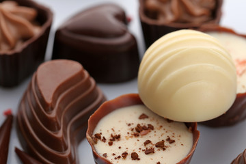 Assorted chocolate candies, close up