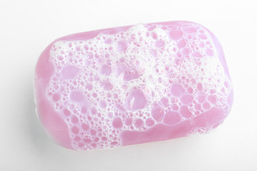 Soap with foam, isolated on white