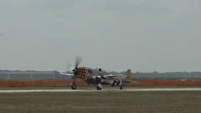 Republic P-47 Thunderbolt taxiing at airfield.  Fighter plane used by US Army Air Force and other forces in World War II.  Recorded in 4K, ultra high definition.