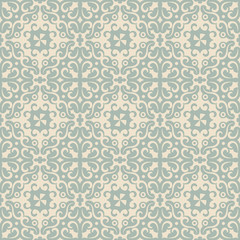 Elegant antique background image of spiral round vine kaleidoscope pattern.
