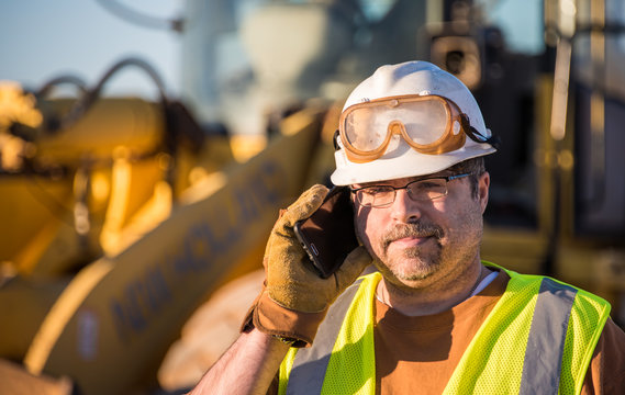 Construction Worker On Cell Phone