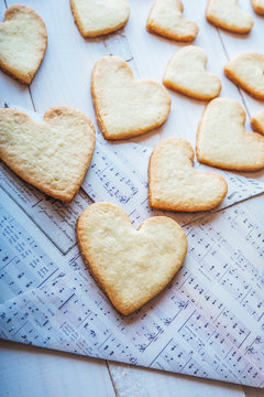 love flies out of the envelope. romantic message on Valentine's Day. cookies in the shape of heart