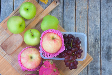 many fruit : apple,grape and dragon fruit