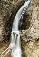 Fototapeta na wymiar waterfall in rocky landscape