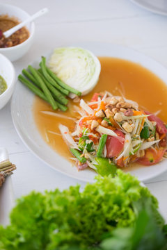 Thai papaya salad serve with vegetables