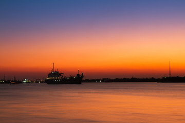 Fototapeta premium Long Exposure Sunrise Seascape with Ocean liner boat on the Sea