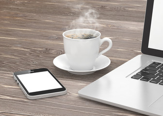 Fototapeta na wymiar Laptop smartphone and coffee cup 