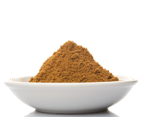 Garam masala or mix spices blend in white bowl over white background