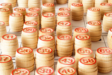 Wooden kegs and cards  for lotto or bingo game 