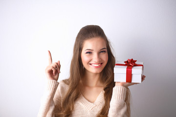 Young woman happy smile hold gift box in hands