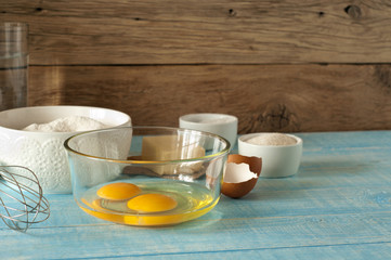 Ingredients for baking on wooden table