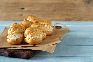 Profiteroles stuffed with crab meat and eggs