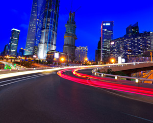 Fototapeta na wymiar Empty road surface with shanghai lujiazui city buildings