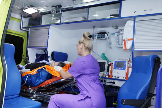  Female nurse on call in the ambulance
