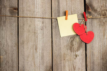 Red heart hanging on the clothesline for Valentines Day