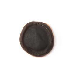 Chocolate coated chewing candy isolated