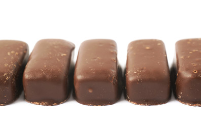 Chocolate coated candy bar isolated