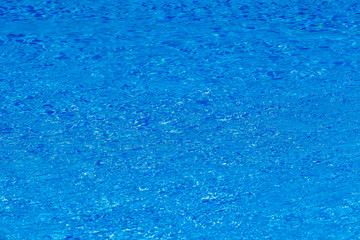 Fototapeta na wymiar fond eau bleue piscine