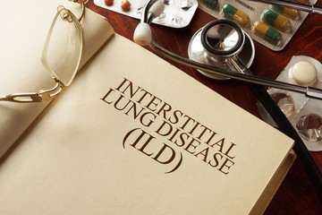 Book with diagnosis Interstitial lung disease (ILD). Medic concept.