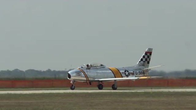 North American F-86 Sabre jet fighter taxis at an airfield.  Recorded in 4K, ultra high definition.