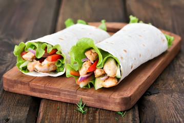 Tortilla wraps with meat and vegetables