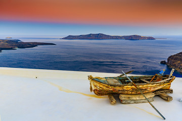 Fototapeta na wymiar Old boat - Santorini, Greece