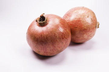 Juicy pomegranate on white background