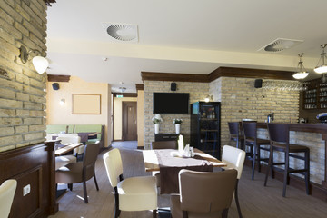 Interior of a hotel restaurant in the morning, sunlight