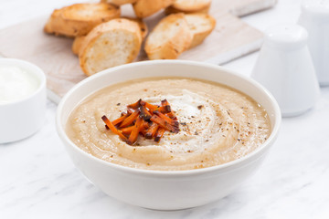 vegetable cream soup with caramelized carrots and croutons