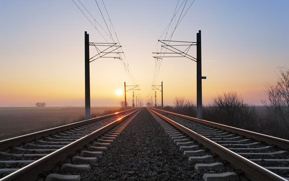 Rrailroad at a sunset