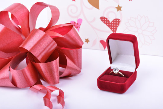 Wedding ring in a red gift box