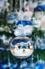 Colorful blue Christmas ball with a snowman