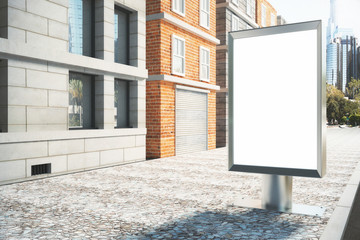 Blank white billboard on the street on a sunny day, mock up