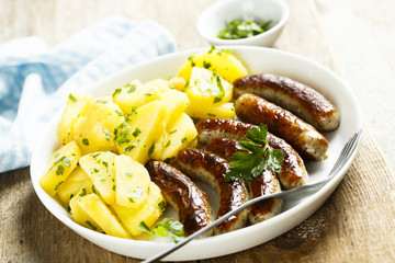Fried sausages with potato salad