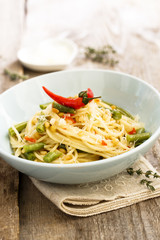 Pasta with green beans, chili and pine nuts