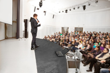 Speaker at Business convention and Presentation. Audience 