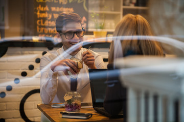 Business Couple In Cafe