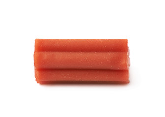 Red licorice stick candy isolated