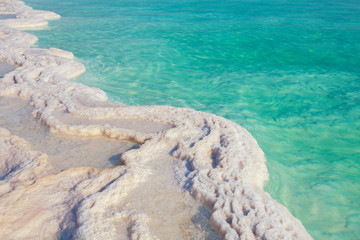 Fototapeta na wymiar Texture of Dead sea. Salt sea shore